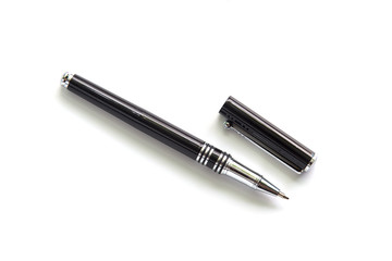 Black metal pen isolated on white background.