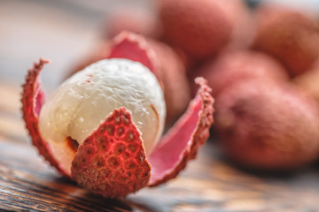 Lichee on wooden table, litchi, lychee fruit detail