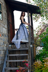 beautiful girl in dress at home