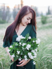 girl with flowers bouquet jasmine