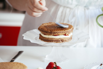 Woman Making The Naked Cake