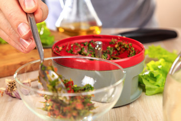 cooking a spicy condiment for meat