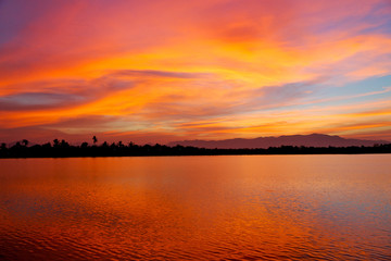  view from water of the sunrise full of  colors