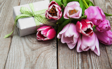 Spring tulips flowers and gift box