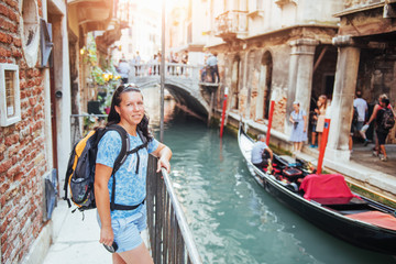 Fototapeta na wymiar Gondolas on the canal in Venice. Venice is a popular destination for tourists. Europe