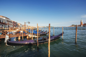 Gondolas on Grand canal in Venice, San Giorgio Maggiore church. San Marco.