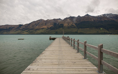 Wooden jetty at the mountain lake, South Island, New Zealand
