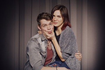 Happy couple in love in a photo booth