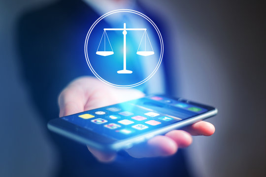 Businessman hand holding mobile phone with justice icon