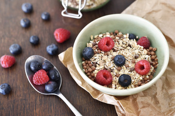 Delicious cereal breakfast with bowl and fresh fruits