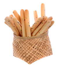 Black sesame biscuits in Bamboo basket isolated on white background