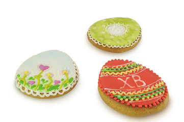 Easter multicoloured spice-cakes like egg isolated on white background