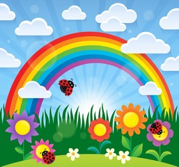 Obraz na płótnie Canvas Spring theme with flowers and rainbow