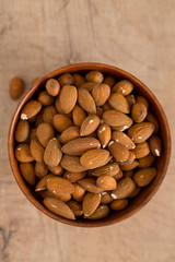 almonds on wooden surface