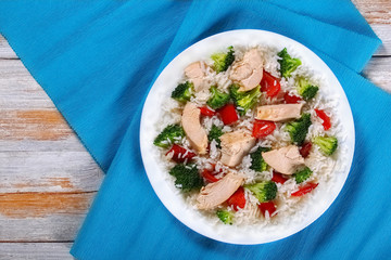 fried vegetables and boiled chicken breast