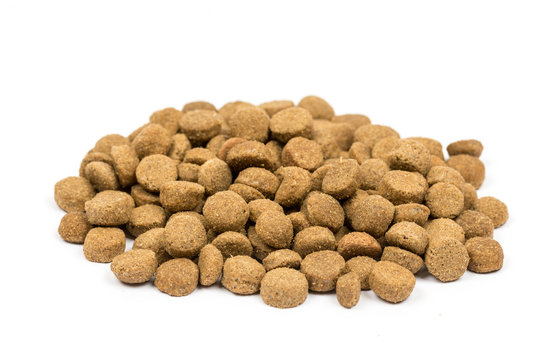 Dog and cat food granules isolated over white background