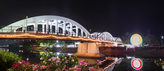 Fototapeta na wymiar Raatchada Bridge on the wang river, lampang, thailand