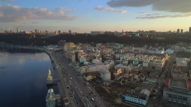 Aerial view of Kiev, capital of Ukraine in sunset lights. Podol area and Dnieper river