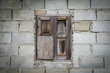 background of old brick wall with vintage window