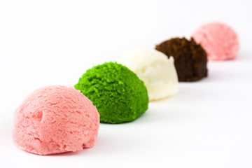 Variety of ice cream scoops, isolated on white background. Copyspace.

