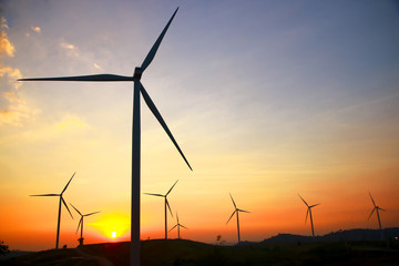 Fototapeta premium Stock Photo - Wind power at sunset
