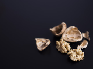 Walnuts isolated on black background