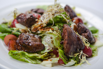 warm salad with chicken liver and grapes