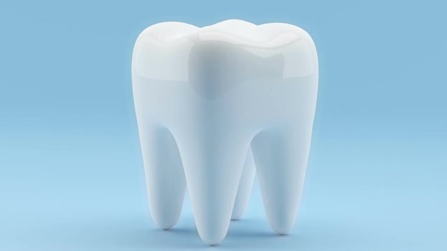 Tooth on a blue background video