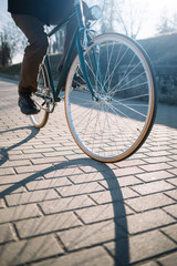 Naklejka premium Cycling retro bicycle in the park