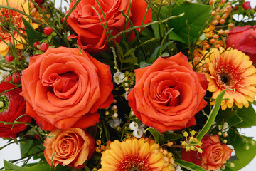 bunch of flowers with red roses and Gerbera