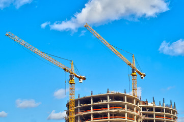 Construction cranes on the construction site