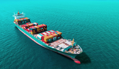 container ship in import export and business logistic.By crane ,Trade Port , Shipping, cargo to harbor, Aerial view, Top view.