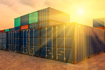 container ship in import export and business logistic.By crane , Trade Port , Shipping.Tugboat assisting cargo to harbor.