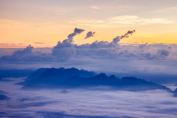 Fototapeta na wymiar Layer of mountains and mist at sunset time, Landscape at Doi Luang Chiang Dao, High mountain in Chiang Mai Province, Thailand