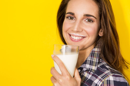 young woman drink milk