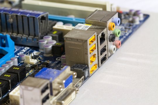 Detail of external interface connectors of dusty used motherboard