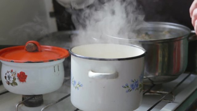 Add a salt to boiling water in pot