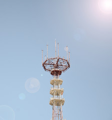 Cellular antennas on a blue sky background