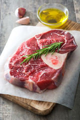 Raw meat on wooden background
