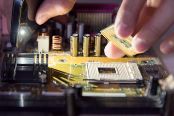 A mainboard ( Main board,cpu motherboard,logic board,system board or mobo board)
close up of electronics circuit board 
