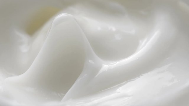 White gentle cosmetic cream. Cosmetics cream with rotate. Close-up shot.