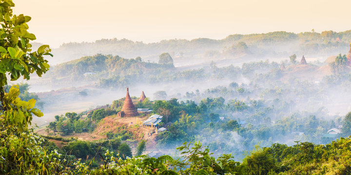 Scenic view of Mrauk U valley during foggy sunrise seen from Shwe Taung Zar Pagoda