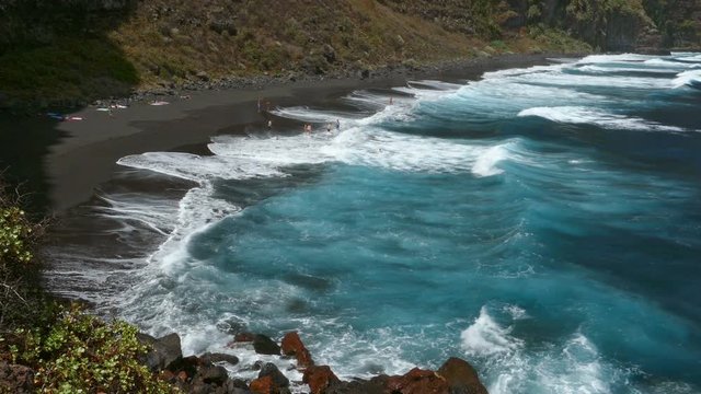 Panoramic view of the shore of Nogales beach, with many waves and strong wind, on the island of La Palma, Canary Islands, Spain.