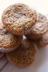 Bran muffins stacked stacked on top of each other