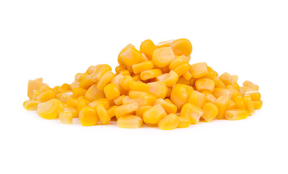 grains of canned corn isolated on white background.