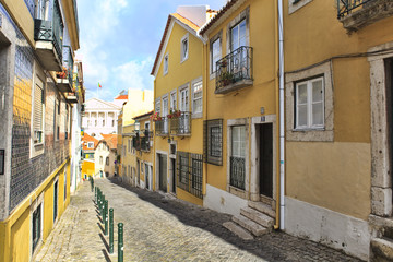 Fototapeta na wymiar Street in old town of Lisbon, Portugal