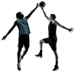 Fototapeta premium two basketball players men isolated in silhouette shadow on white background