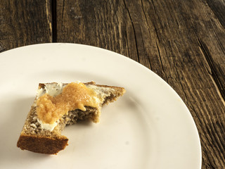 The half-eaten sandwich with cod caviar