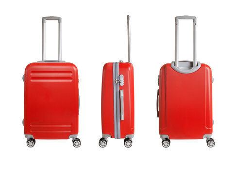 Three suitcases isolated on white background. Polycarbonate suitcases isolated on white. Red suitcases.