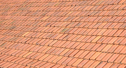 Old red roof tiles background